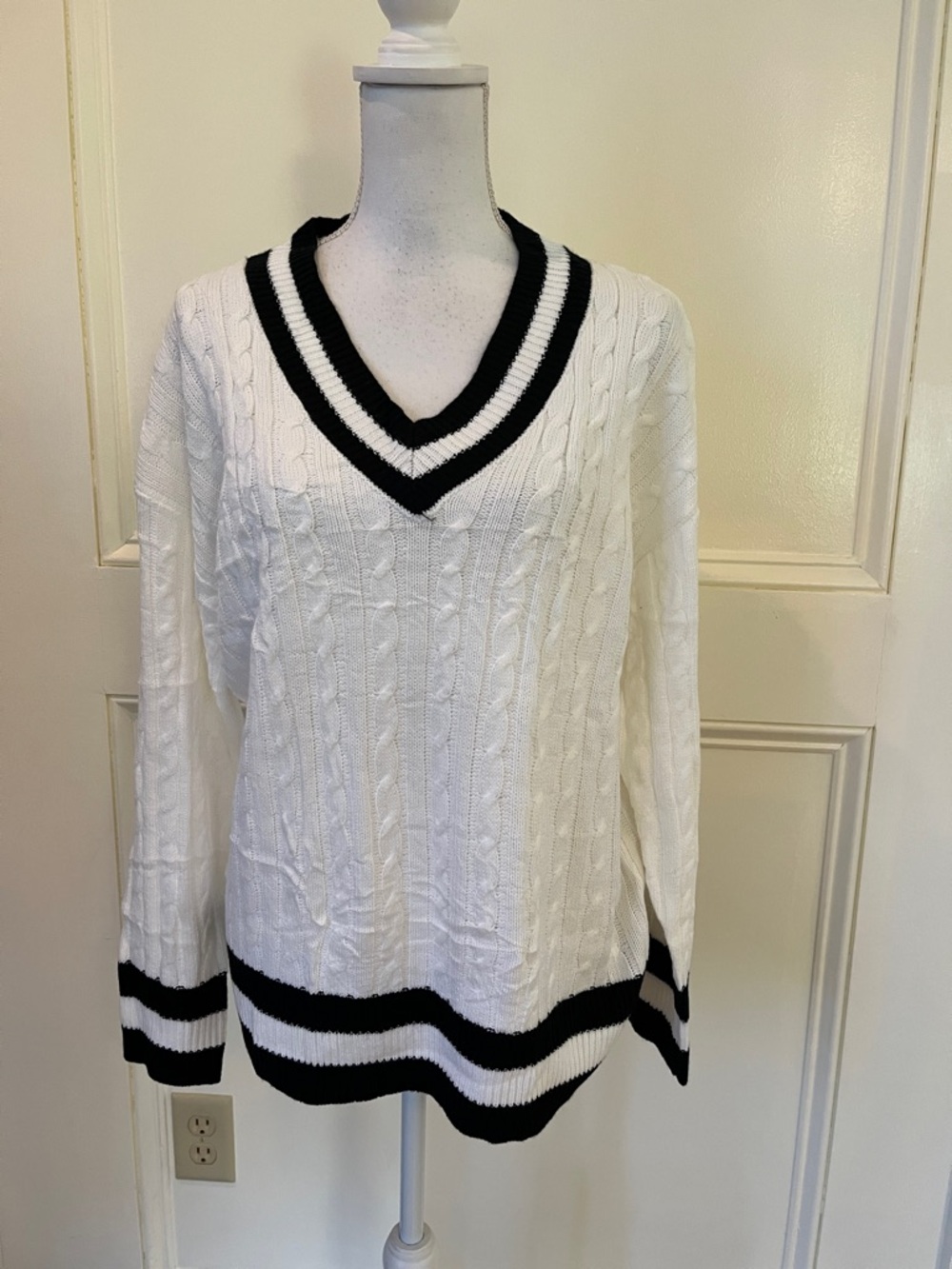 Classic White Cable-Knit V-Neck Sweater with Black Trim